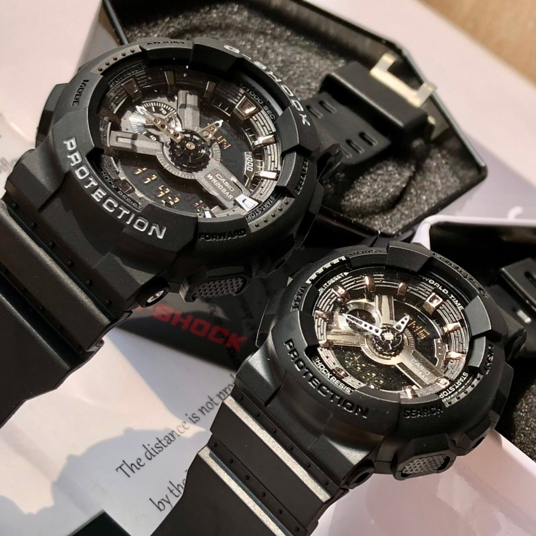 Black Casio watch with round multi-dial face and black resin strap