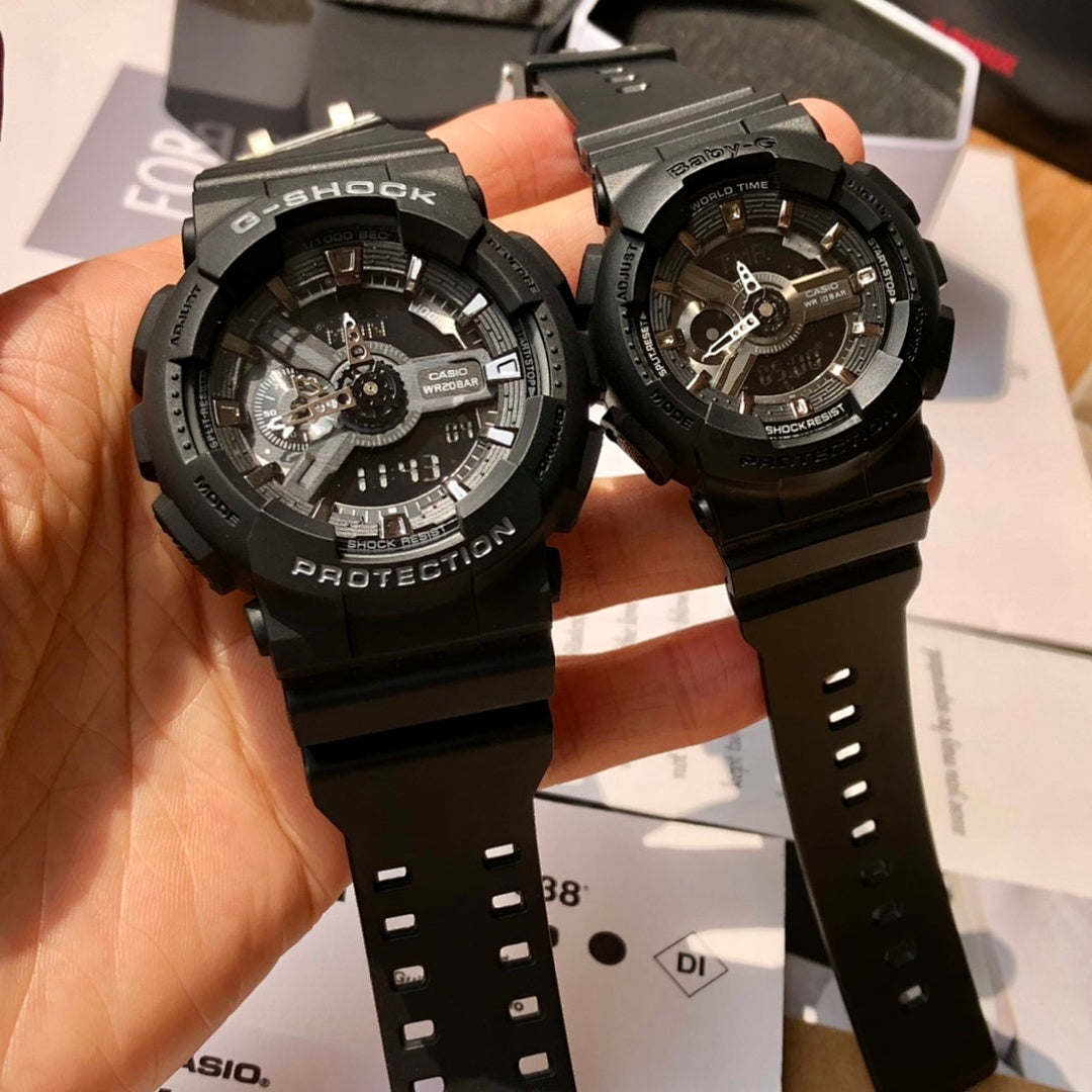 Black Casio watch pair with round dials and thick resin straps