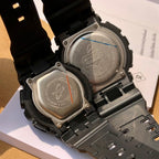 Back view of black Casio watches with stainless covers and screw heads