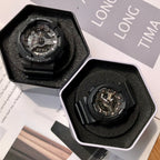 Black Casio watch with round face in open display box with foam inserts