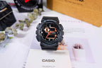 Casio G-Shock watch with black resin strap and copper-toned dial