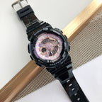 Casio watch with black resin strap and pink multi-dial face