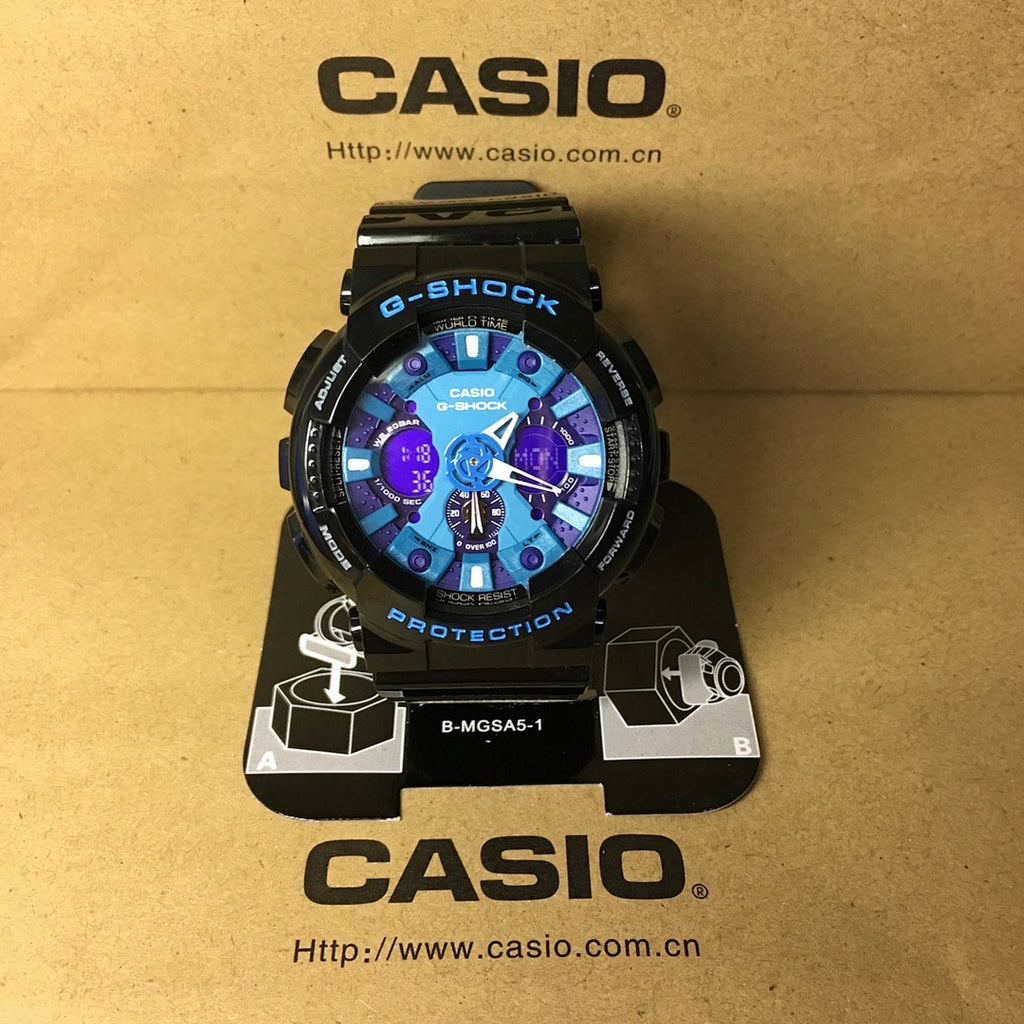 Casio G-Shock watch with black case, purple dial, and blue accented subdials.