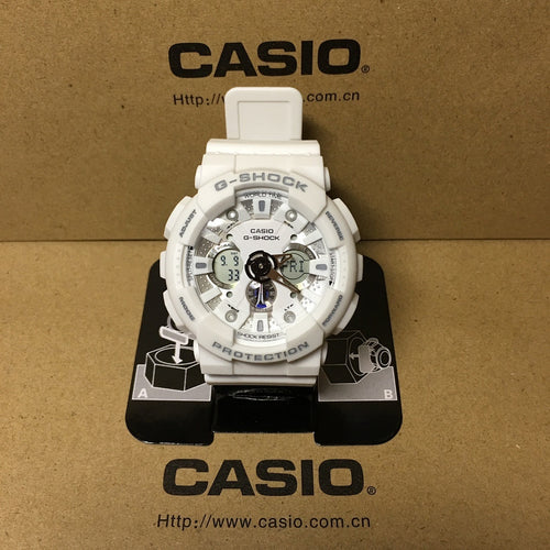 Casio G-Shock watch with white case, silver dial, and circular subdials.