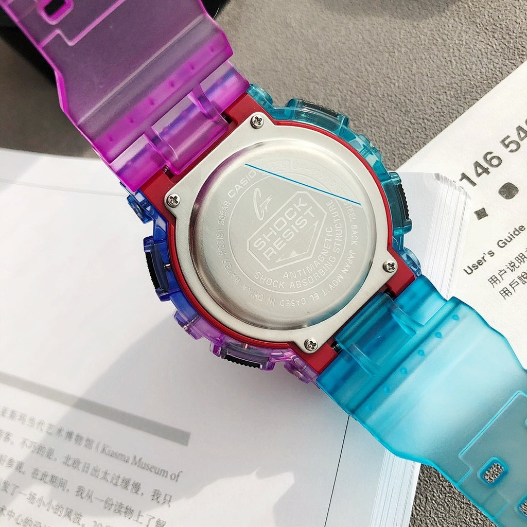 Casio G-Shock watch with aqua-to-teal translucent strap and round silver-toned case back