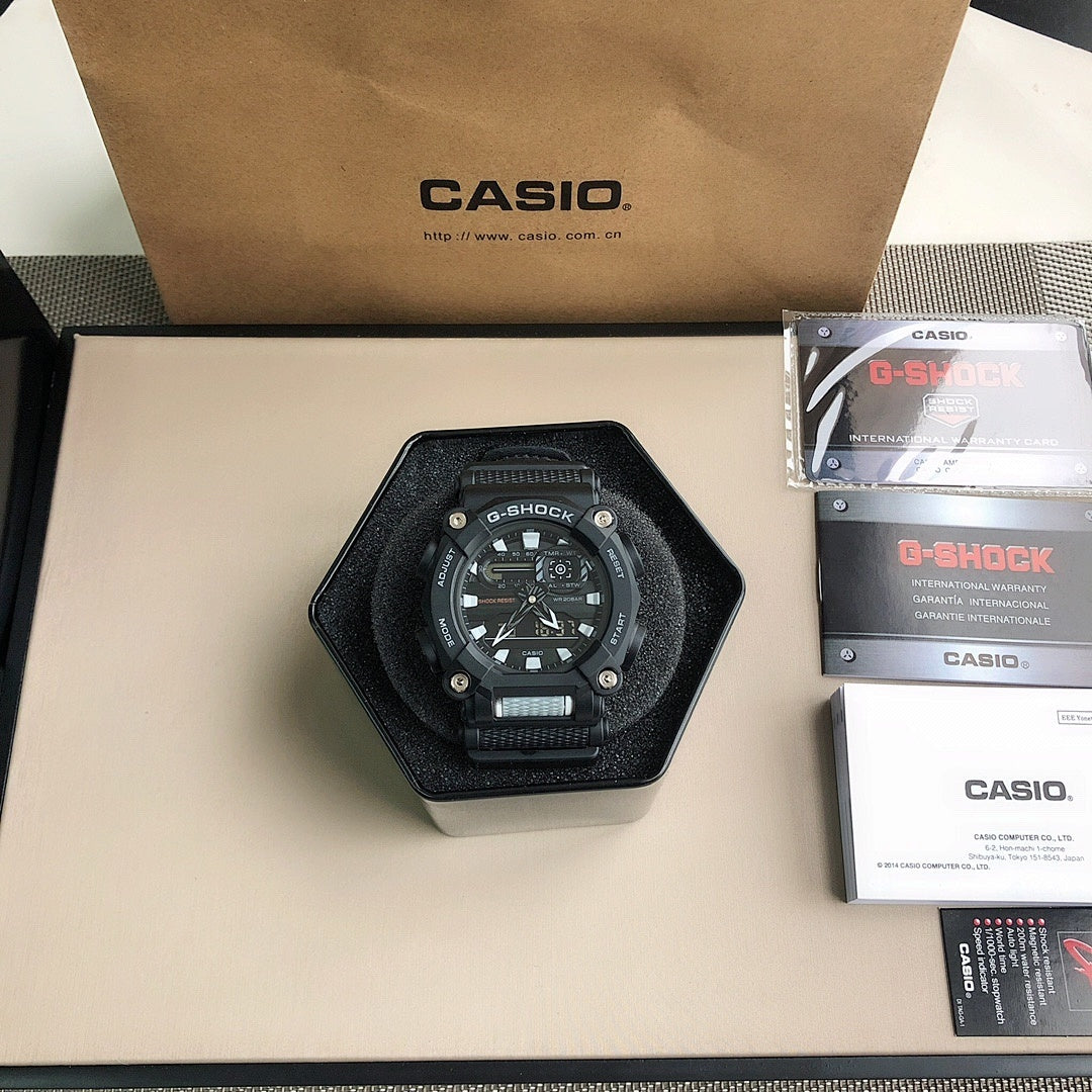 Casio G-Shock wristwatch with retail packaging, black resin strap and dark dial