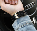 Casio G-Shock watch with black ribbed strap and gold-toned buckle clasp