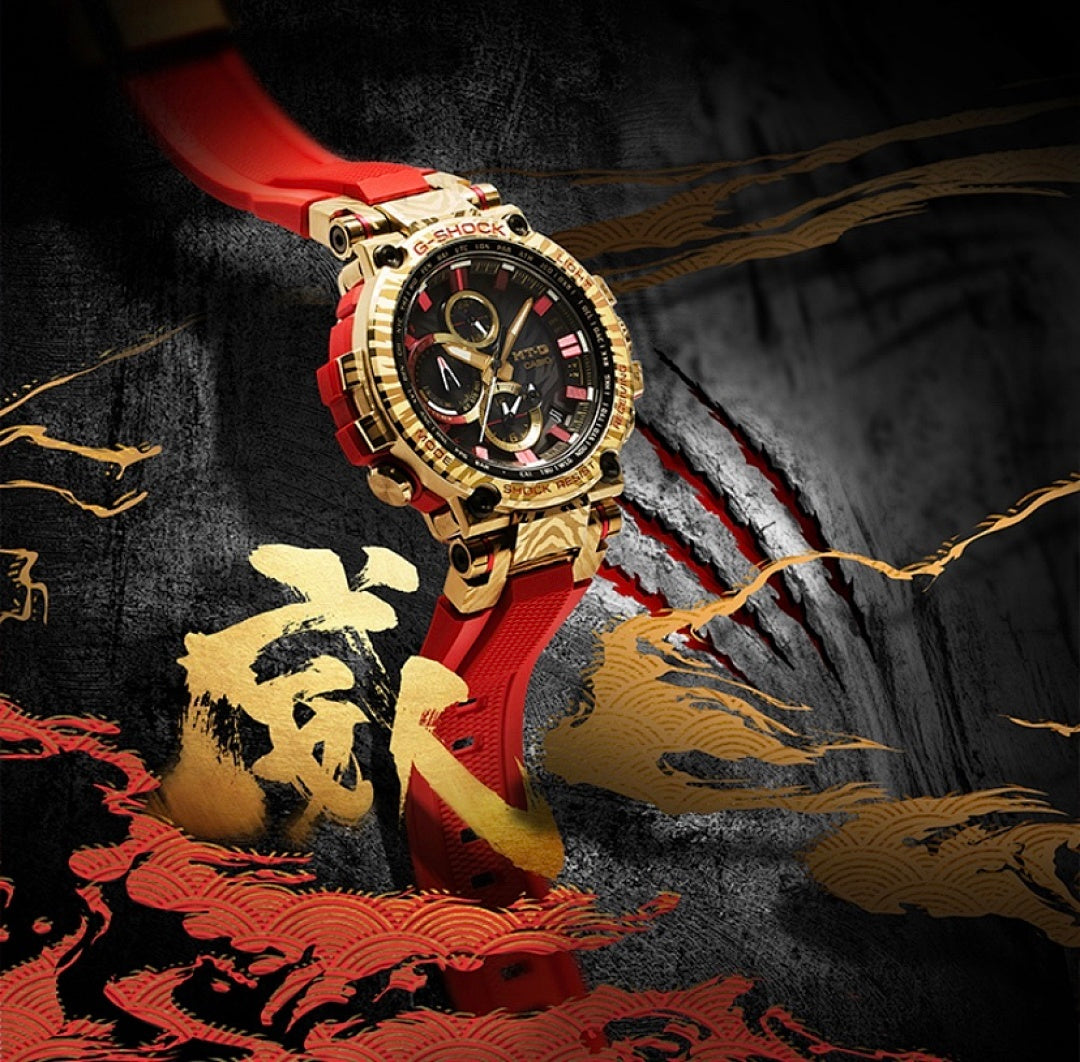 Casio G-Shock watch standing on dark textured surface, red strap and gold-tone case