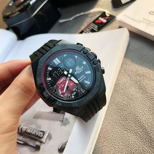 Casio Edifice wristwatch with black resin strap and dark blue dial, red accents