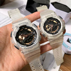 Casio G-Shock watches held in hand, clear straps with black dials
