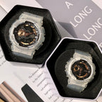 Casio G-Shock watch set in black trays, clear cases and black dials