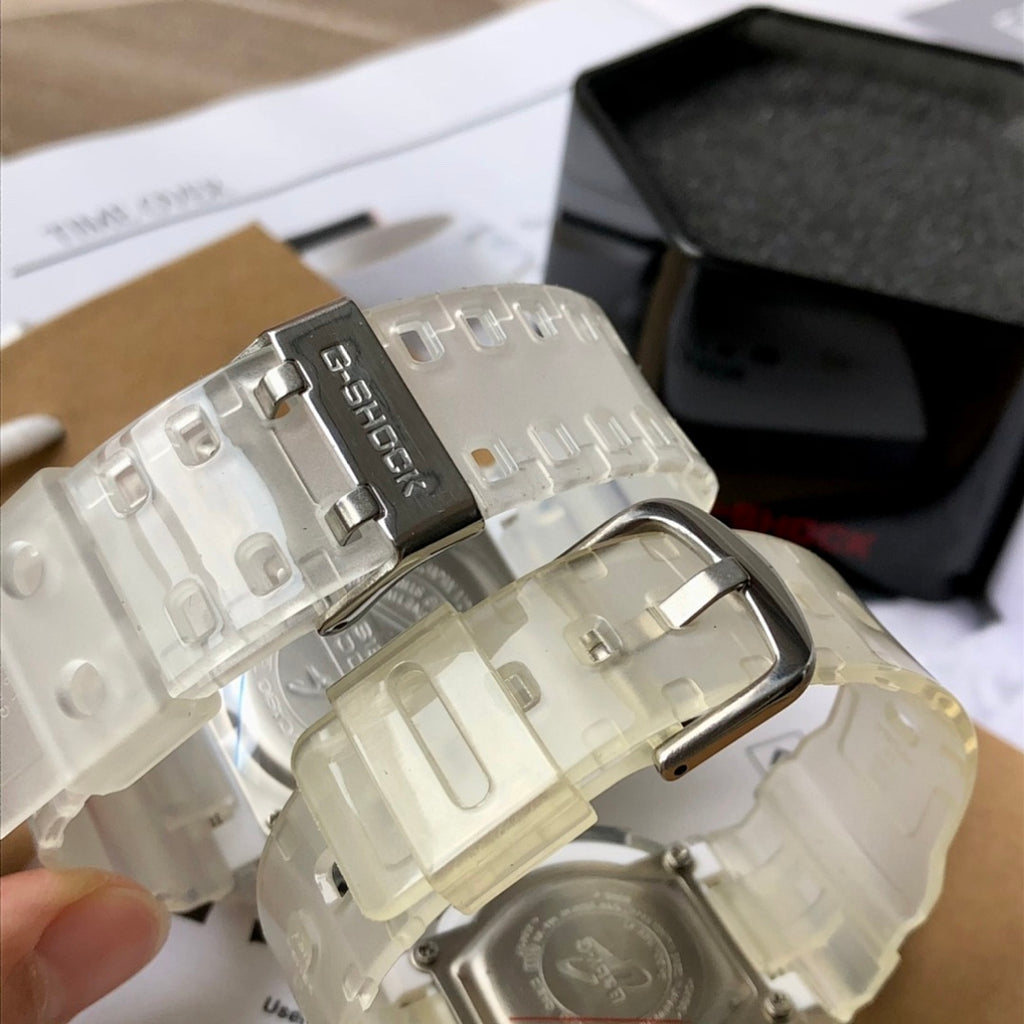 Casio G-Shock watch with clear strap and metal clasp, black dial view
