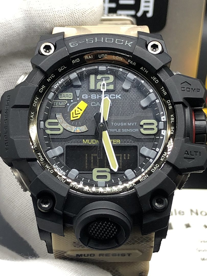 Casio G-Shock watch with black bezel, large luminous hands, and dark dial