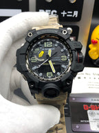Casio G-Shock watch close-up with black bezel, green markers, and camo strap