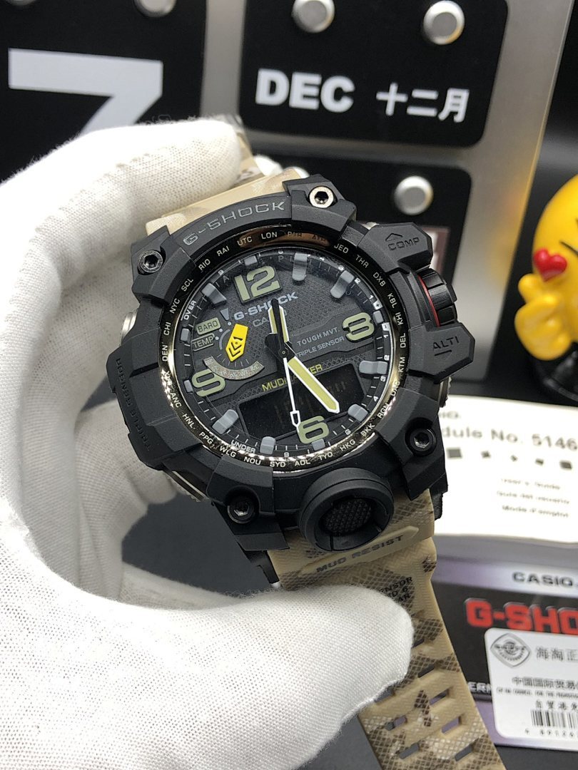 Casio G-Shock watch front view with black case, green digits, and camo band