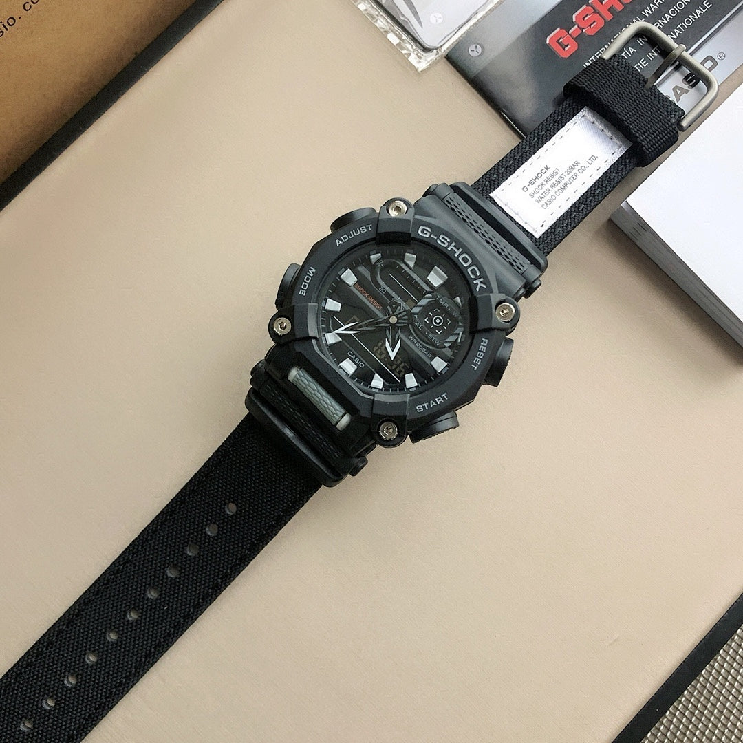 Casio G-Shock wristwatch with black dial and perforated black strap