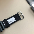 Casio watch black fabric strap with metal buckle and white brand label