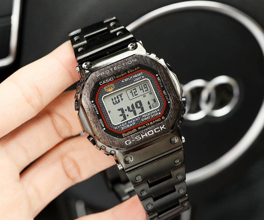 Black metal digital G-Shock watch with LCD display