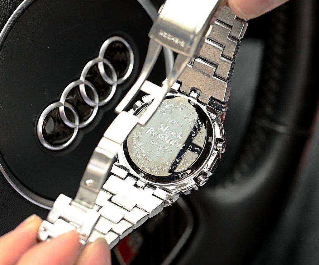 Silver-tone metal wristwatch with textured case detail