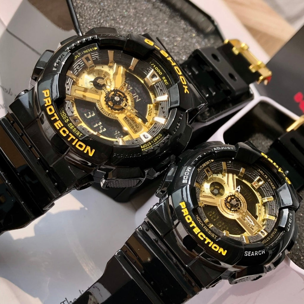 Casio G-Shock and Baby-G watches, black bezels with gold center dials and Protection branding.