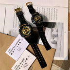 Casio G-Shock and Baby-G watches with black straps, gold dials, and hanging tag paper.