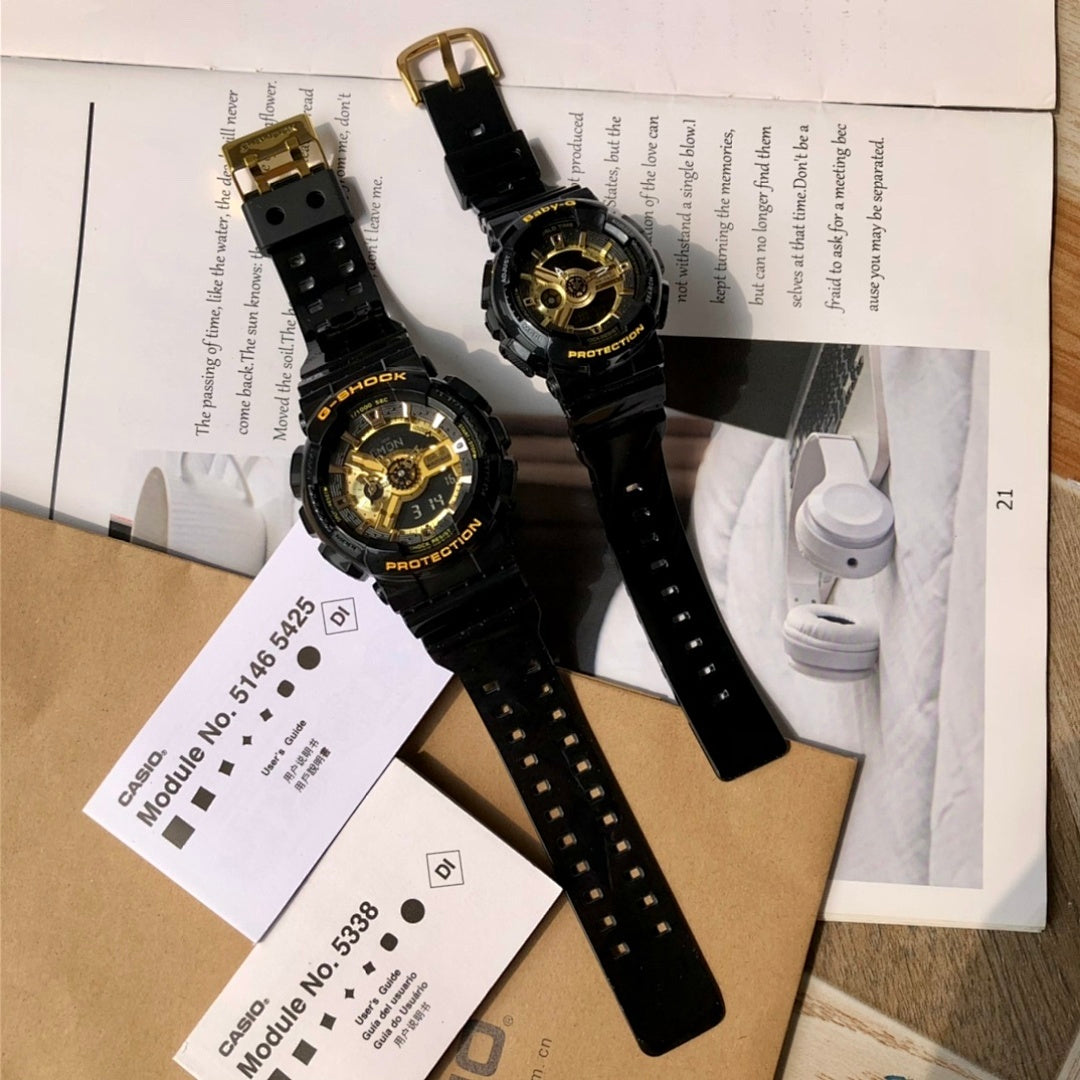Casio G-Shock and Baby-G watches with black straps, gold dials, and hanging tag paper.
