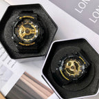 Casio G-Shock and Baby-G watches in black foam trays, gold dials on black straps.