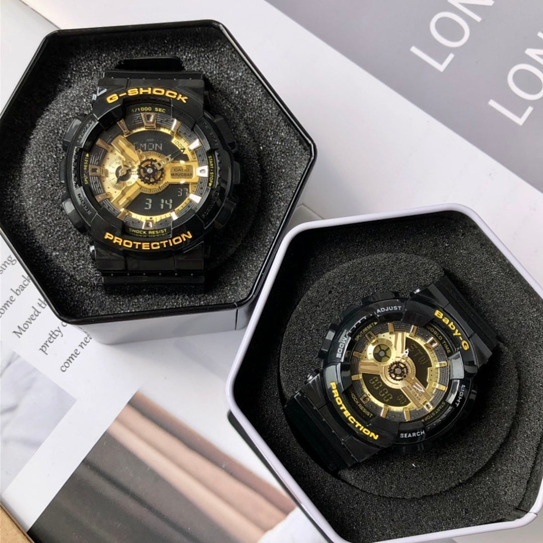 Casio G-Shock and Baby-G watches in black foam trays, gold dials on black straps.