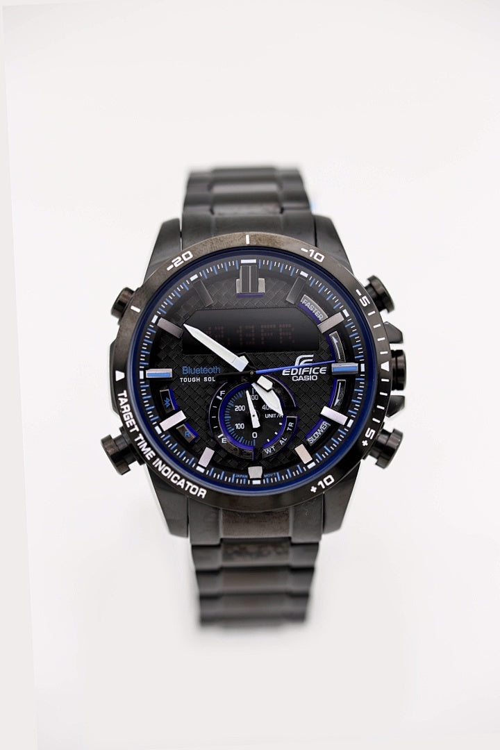 Casio Edifice watch front view with dark blue dial and black metal bracelet