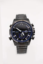 Casio Edifice watch front view with dark blue dial and black metal bracelet