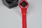 Red G-Shock wristwatch with red strap, side view