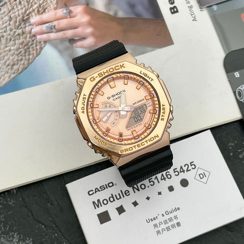 Casio G-Shock analog-digital watch with rose-gold bezel and black resin strap