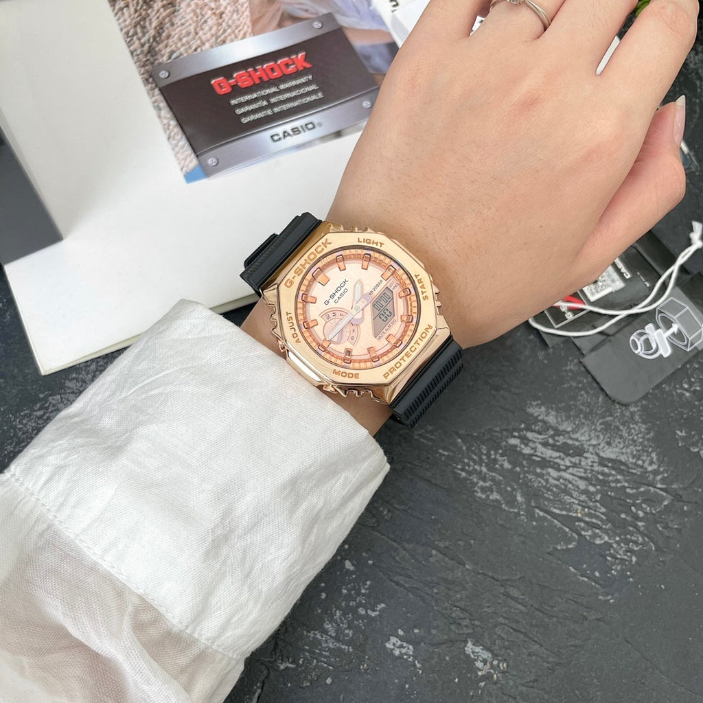 Casio G-Shock wristwatch with rose-gold bezel and black resin band