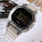 Casio watch close-up, clear resin strap and black LCD display with digits