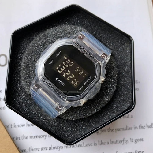 Casio watch with clear resin strap and black digital face in protective case