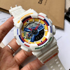 Casio G-Shock digital watch held in hand, white strap, multicolor dial