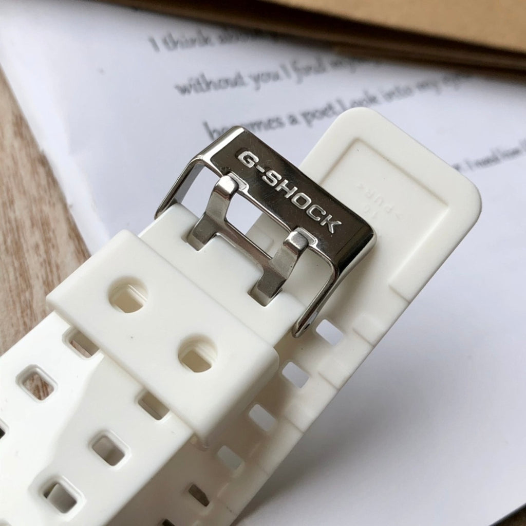 Casio G-Shock watch case back with metal clasp on white resin band