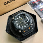 G-Shock digital watch with black face, orange markers, and textured black resin band