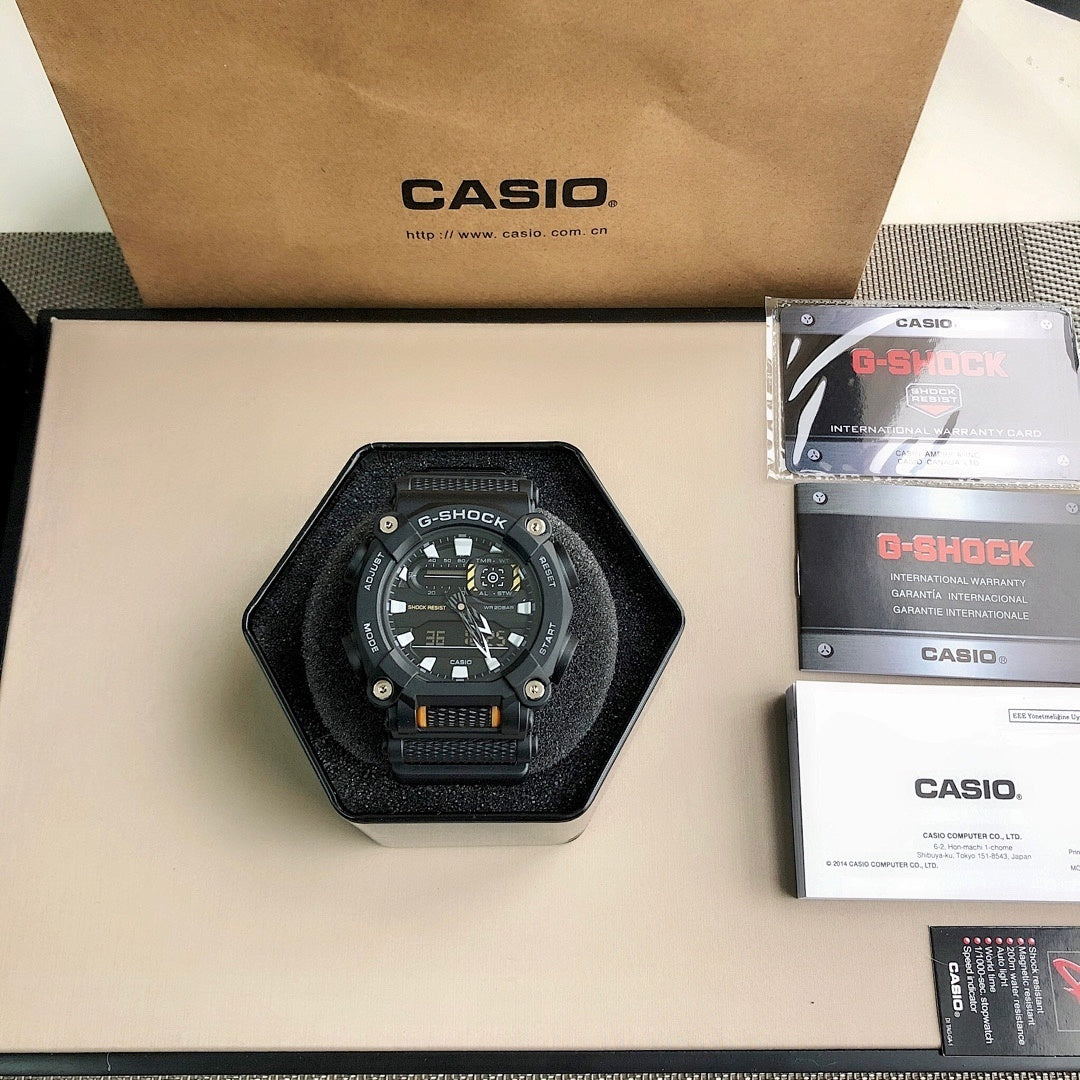 G-Shock watch on black octagonal display with black resin strap and detailed dial
