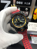 Casio sports watch close-up, black dial with yellow-green markers, red strap