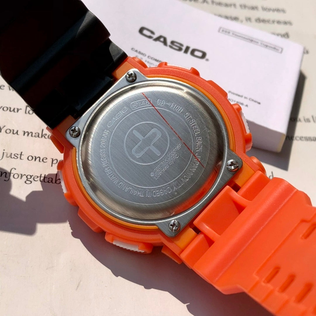 Orange G-Shock wristwatch back with silver caseplate and orange bezel