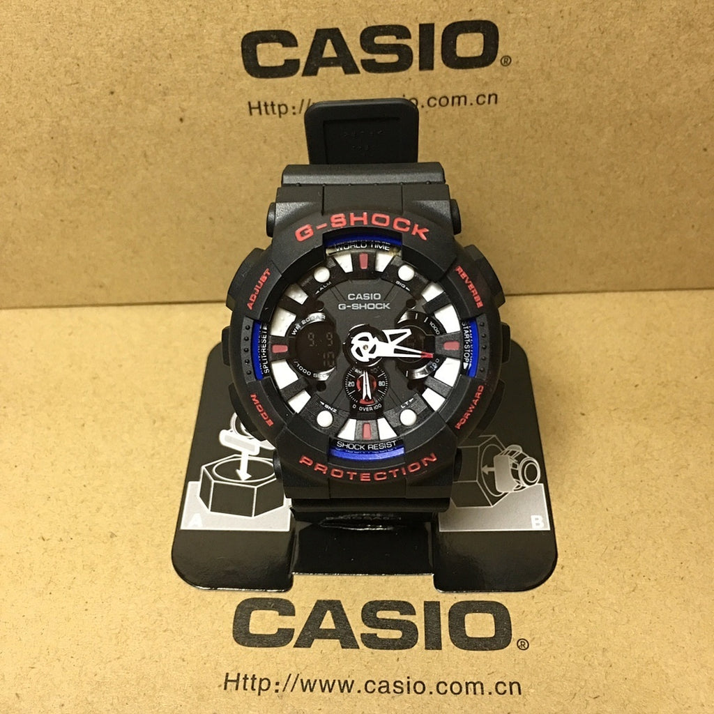 Casio G-Shock watch with black resin strap and black multi-dial face with blue accents