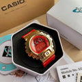 Casio watch with red resin strap and gold-tone case, red digital face