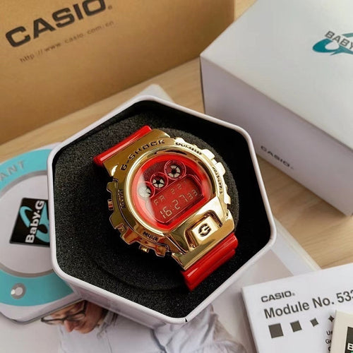 Casio watch with red resin strap and gold-tone case, red digital face
