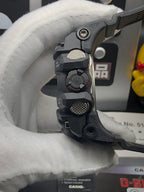Casio G-Shock watch side view with knobs and black strap