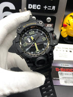 Casio G-Shock watch front view with black bezel and black perforated strap