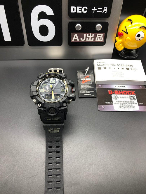 Casio G-Shock watch shown front with black dial and perforated black strap