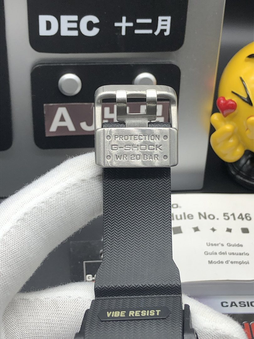 Casio G-Shock watch buckle with PROTECTION marking on black strap