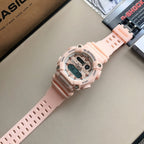 Casio G-Shock digital watch with light pink resin strap, angled front view