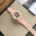 Casio G-Shock digital watch with light pink resin strap and clasp, side angled view